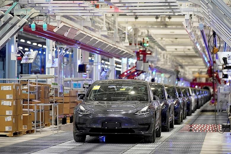 Tesla cars at a Shanghai manufacturing plant. The China Association of Automotive Manufacturers has urged the government to boost support for exports of China-made cars.