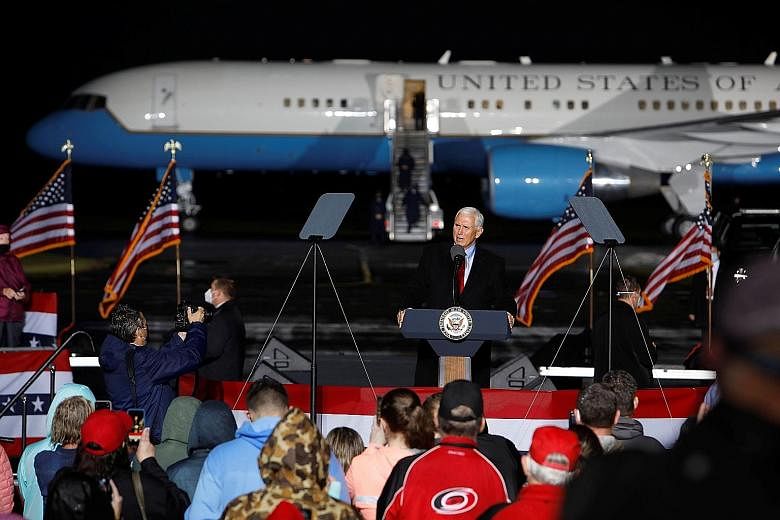American Vice-President Mike Pence campaigning in Kinston, North Carolina, on Sunday. His chief of staff Marc Short as well as multiple aides have recently tested positive for the coronavirus. PHOTO: REUTERS