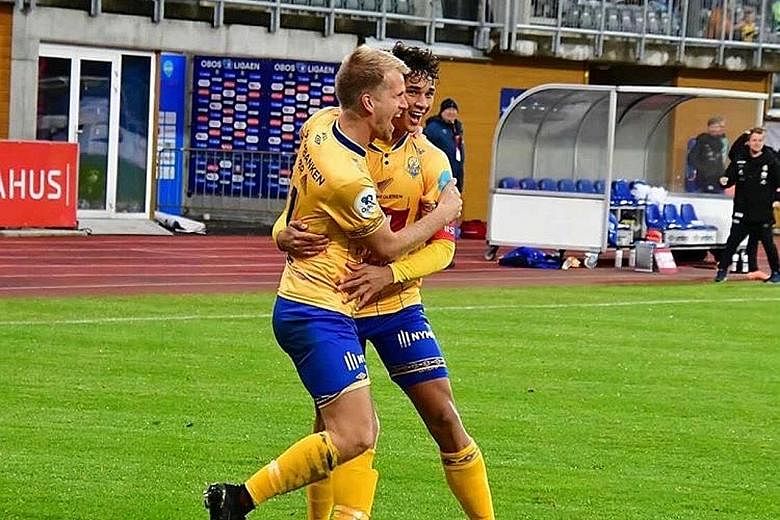 Ikhsan Fandi celebrating with Jerv teammate Daniel Aase during the 4-2 home win over Oygarden last Saturday. The Singaporean scored two goals in the victory. PHOTO: FK JERV