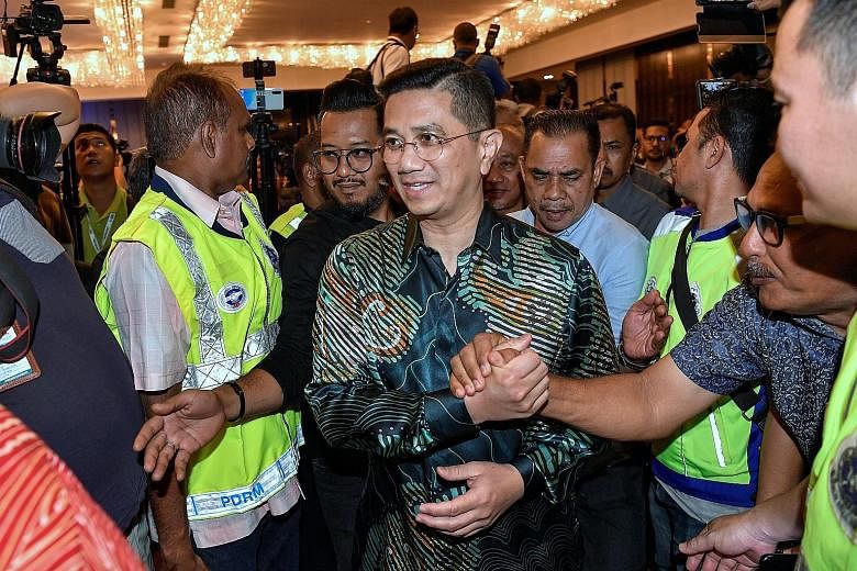 Senior Minister for Economy Azmin Ali (left) and Home Affairs Minister Hamzah Zainuddin have been accused by the Malaysian opposition of being the masterminds behind the recent failed attempt to declare a state of emergency in the country.