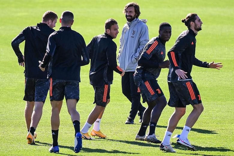 Andrea Pirlo overseeing training as the Italian champions prepare to take on Barcelona.