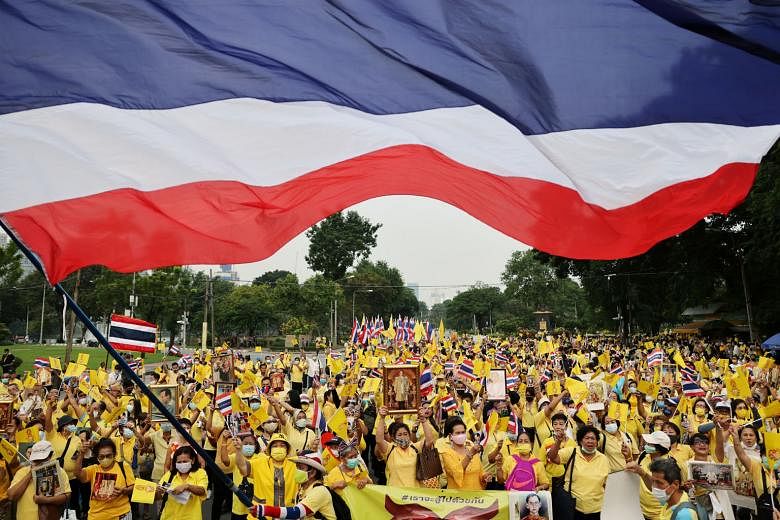 Thai royalists demonstrating in Bangkok yesterday in support of King Maha Vajiralongkorn. So far, royalist demonstrations have been considerably smaller than the tens of thousands of people who have joined the biggest protests against the government,