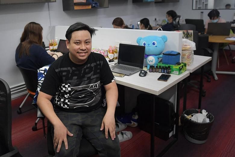 Mr Marcus Yeo urges job seekers who may be hesitant to switch sectors to give it a try. "If I never made the switch, I would never have explored logistics and found something I enjoy doing," he said. ST PHOTO: ALPHONSUS CHERN
