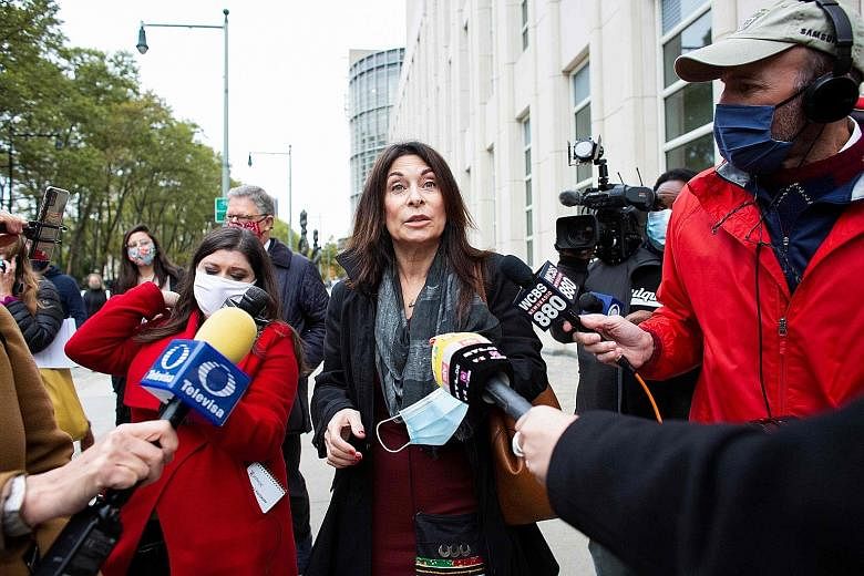 NXIVM cult leader Keith Raniere's ex-girlfriend and former member of the cult, Ms Toni Natalie, leaving the New York court after his sentencing on Tuesday. Several other people affiliated with NXIVM have pleaded guilty to criminal charges. PHOTO: AGE