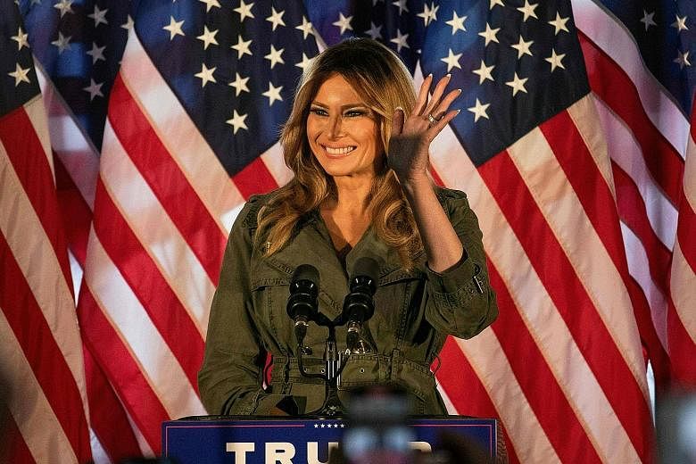 First Lady Melania Trump campaigned for her husband in Pennsylvania. PHOTO: AGENCE FRANCE-PRESSE US President Donald Trump campaigning on Tuesday at Capital Region International Airport in Lansing, Michigan, surrounded by a large crowd of supporters,
