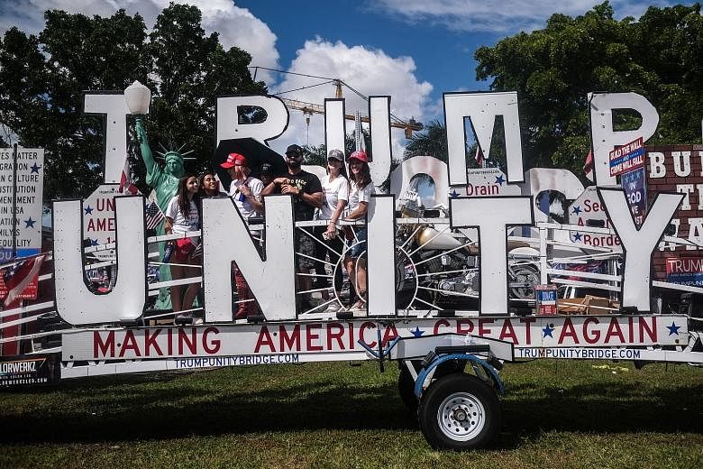A parade in support of United States President Donald Trump in Miami, Florida, last Sunday. The writer says the stage has been set for the continuation of a persistent problem in America that will continue to cloud and confuse the political debate an