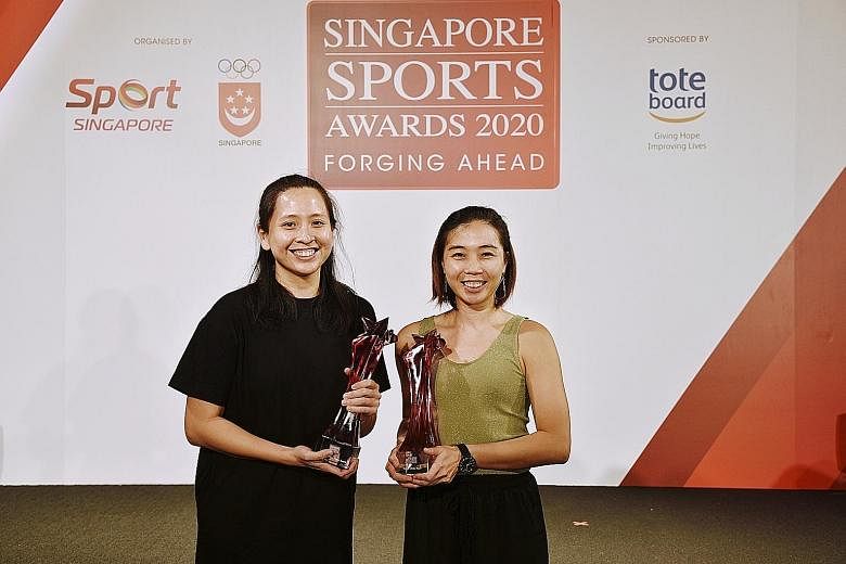 Coach of the Year Louise Khng (far right) and floorball former co-captain Debbie Poh with their trophies at the Singapore Sports Awards yesterday.