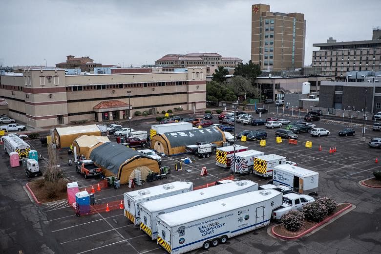 Texas Tech University Health Sciences Centre El Paso has put up tents in its parking lot to cope with the number of Covid-19 patients. The state has the largest rise in US hospitalisations. PHOTO: NYTIMES