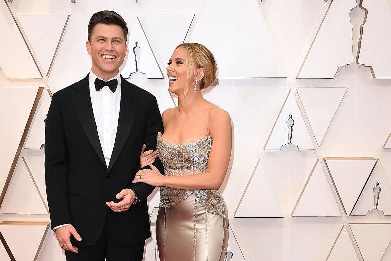 Actress Scarlett Johansson arriving with her then fiance, comedian Colin Jost, for the 92nd Oscars at the Dolby Theatre in Hollywood, California, on Feb 9.