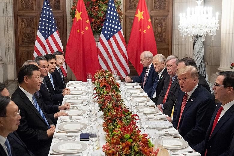 US President Donald Trump meeting his Chinese counterpart Xi Jinping in Buenos Aires, Argentina, in December 2018. PHOTO: AGENCE FRANCE-PRESSE