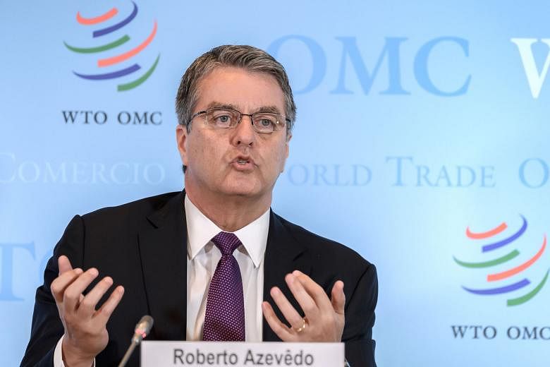OUTGOING WTO CHIEF ROBERTO AZEVEDO Former Brazilian diplomat Roberto Azevedo stepped down as World Trade Organisation director-general on Aug 31, earlier than planned, because of personal reasons, and left a leadership gap. PHOTOS: AGENCE FRANCE-PRES