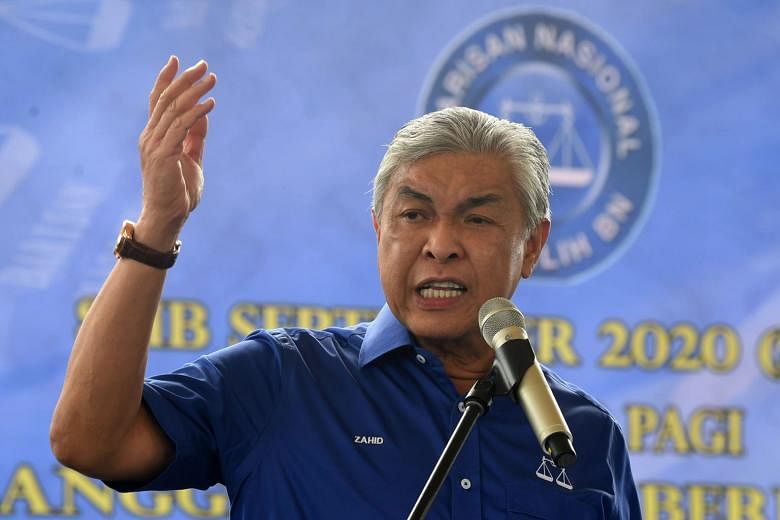 In a meeting on Thursday, Umno president Ahmad Zahid Hamidi repeated that the party will back Budget 2021, to be tabled next Friday, and called for snap polls to be held after the Covid-19 pandemic is under control. PHOTO: BERNAMA