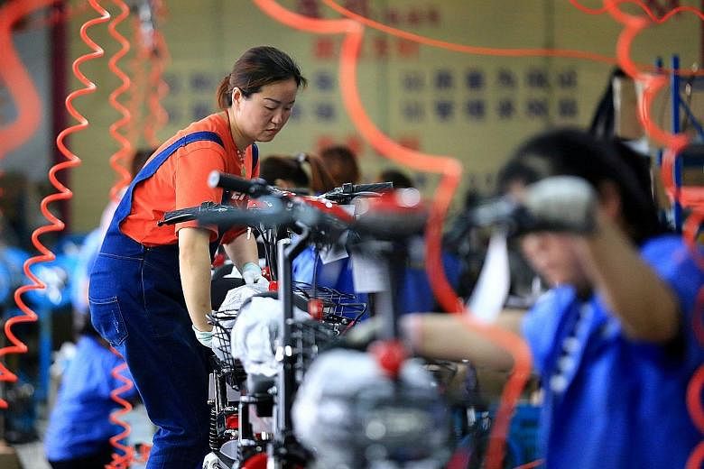 China's industrial sector is steadily returning to the levels seen before Covid-19 paralysed huge swathes of the economy. PHOTO: REUTERS