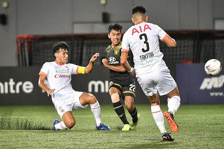 Tampines' Syahrul Sazali scoring the first goal against Albirex in their SPL match at Our Tampines Hub yesterday. Jordan Webb made it 2-0 with a 56th-minute penalty. The Stags (12 points) lead the White Swans and Balestier by a point.