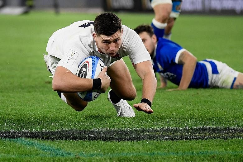 England scrum-half Ben Youngs diving across the line to score a try during the Six Nations match against Italy on Saturday. He had two tries on his 100th appearance as England won 34-5 in an empty Olympic Stadium.