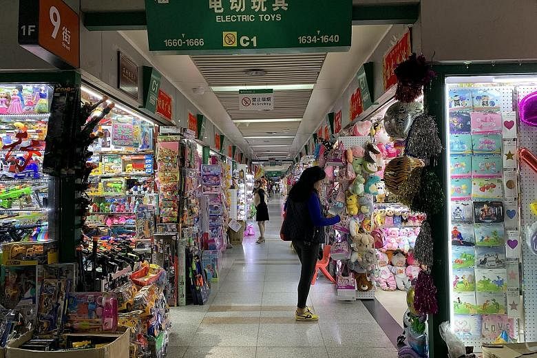The International Trade City in Yiwu city, Zhejiang province, has five interlinked blocks that sell everything from bras to hardware, as well as the world's largest small-commodities wholesale market spanning nearly 1,000 football fields. ST PHOTO: T