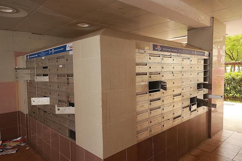 Letterboxes in Toa Payoh that were apparently broken into last month. A total of 229 sets of vouchers were reported stolen as at last Wednesday.