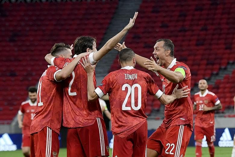 Russian footballers can play in national colours at next year's delayed Euro 2020 but only in neutral gear if they qualify for the 2022 World Cup. PHOTO: AGENCE FRANCE-PRESSE
