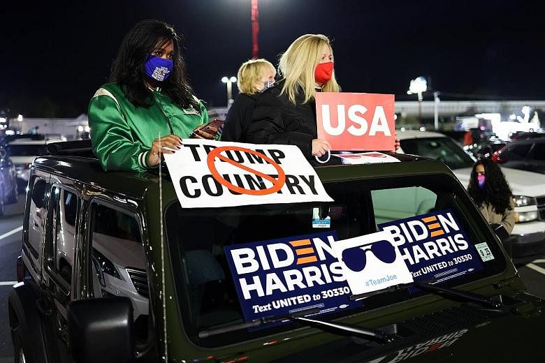 Right: Supporters of United States President Donald Trump celebrating his win in Ohio at a Republican watch party in New Hudson, Michigan on Tuesday. Far right: Supporters at a drive-in election night event for Democratic presidential nominee Joe Bid