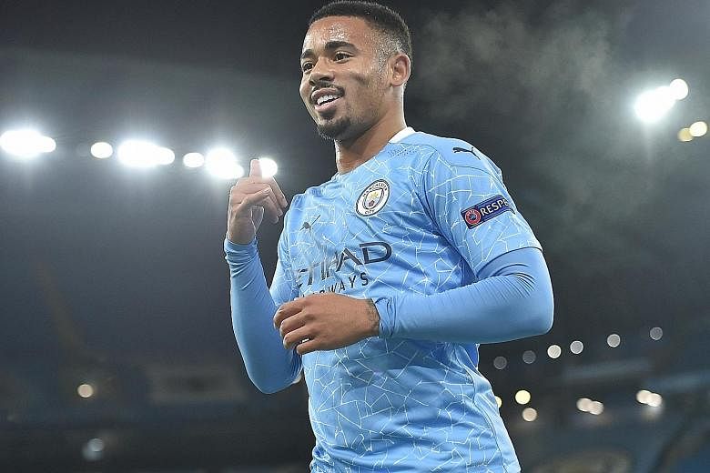 Diogo Jota beating Atalanta goalkeeper Marco Sportiello to put Liverpool in the lead in their Champions League match on Tuesday and score for the fourth straight game in all competitions. Manchester City striker Gabriel Jesus (below) celebrating his 