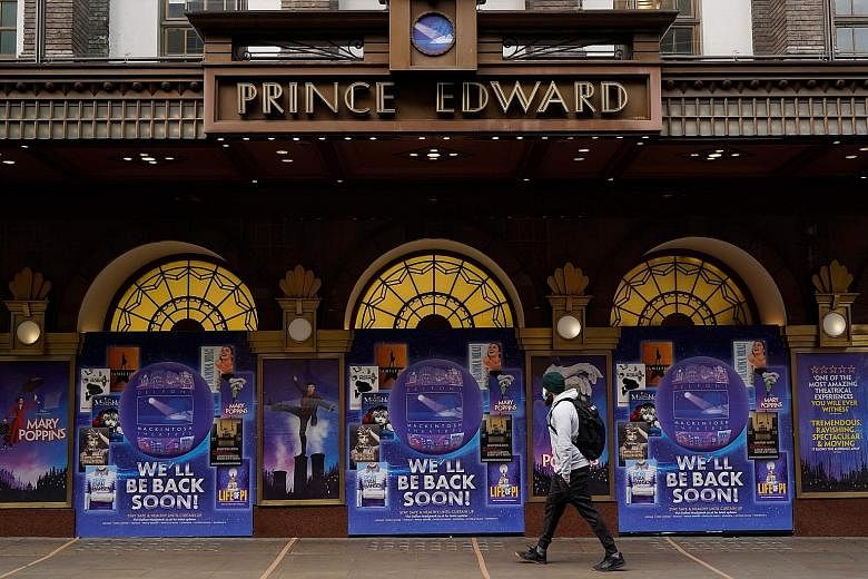 A closed theatre in London yesterday, the day England entered its second lockdown to curb the spread of the coronavirus. The restrictions include a return to working from home where possible and the closure of all non-essential shops and services. Br