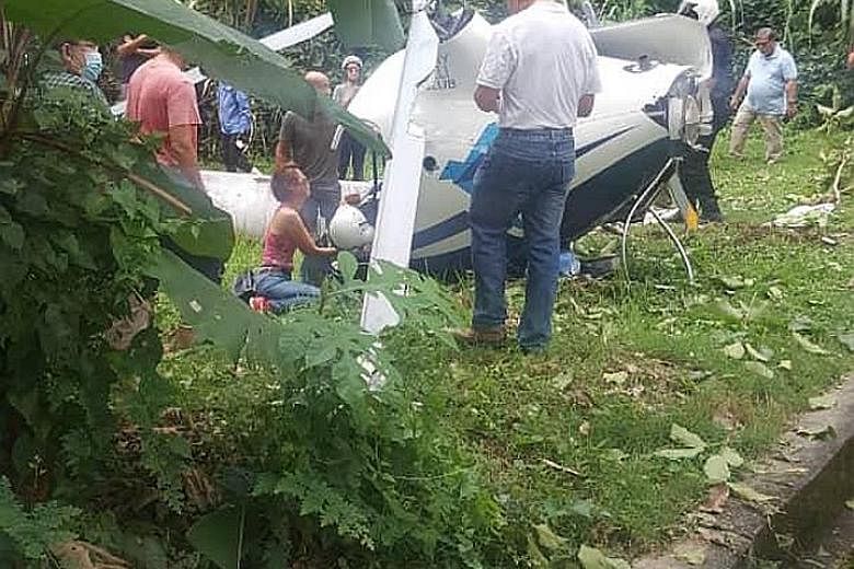 The crashed helicopter in Selangor, after it was involved in a mid-air collision with another copter yesterday.