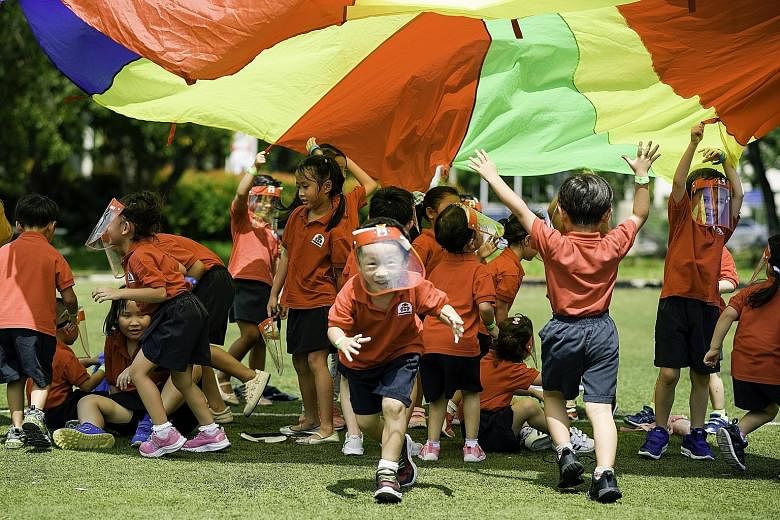 Pre-schoolers from Maple Bear playing games to raise funds for Make-A-Wish Foundation and Children's Wishing Well. Social distancing rules meant activities had to be confined within each pre-school centre. PHOTO: MAPLE BEAR SINGAPORE