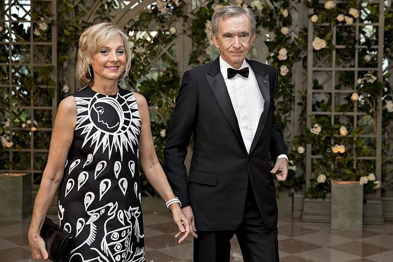 Mr Bernard Arnault and his wife Helene in a 2018 photo. PHOTO: BLOOMBERG The first four centibillionaires with fortunes exceeding US$100 billion are (from left) Mr Jeff Bezos, Mr Elon Musk, Mr Bill Gates and Mr Mark Zuckerberg