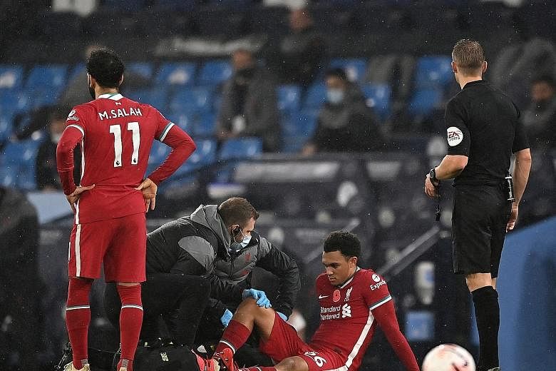 Liverpool's Trent Alexander-Arnold receiving treatment after suffering an injury during the 1-1 Premier League draw with Manchester City.