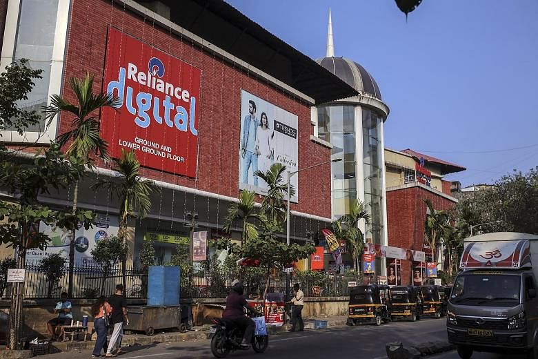 A Reliance Mall in Mumbai's Borivali suburb that is just one of billionaire Mukesh Ambani's many brick-and-mortar stores in India. Besides his physical stores, Mr Ambani also has retail websites like JioMart that are elbowing their way into a space l