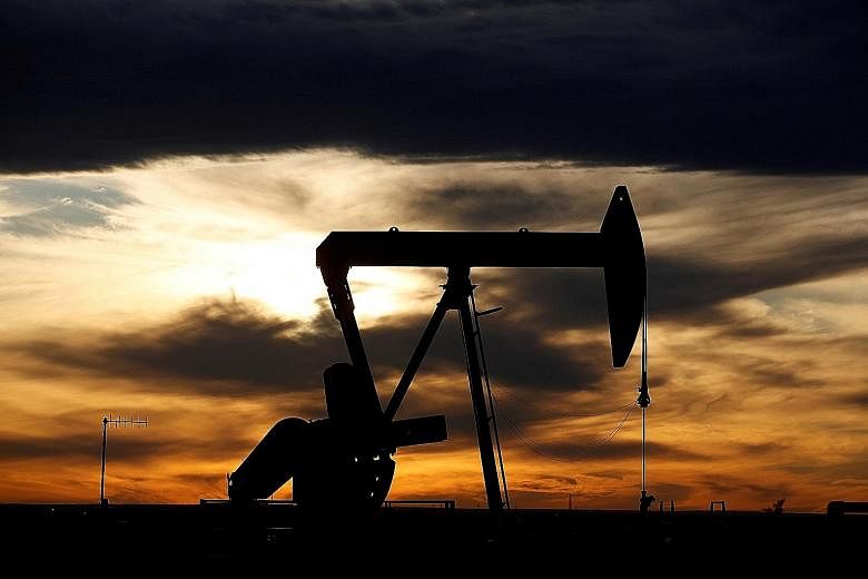 A crude oil pump jack on a drill pad in Texas last year. The American Petroleum Institute reported crude inventories dropped by 5.15 million barrels last week, with petrol and diesel also decreasing, according to sources.