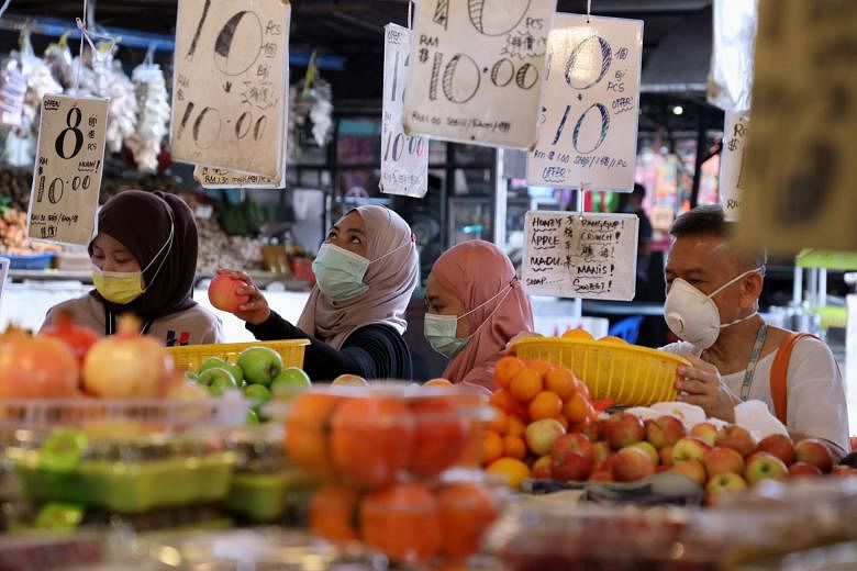 Malaysians hit hard by the coronavirus pandemic are hoping that some of the promises in next year's budget will help them keep their finances above water. Finance Minister Tengku Zafrul Aziz said a raft of measures in the budget is aimed at the botto