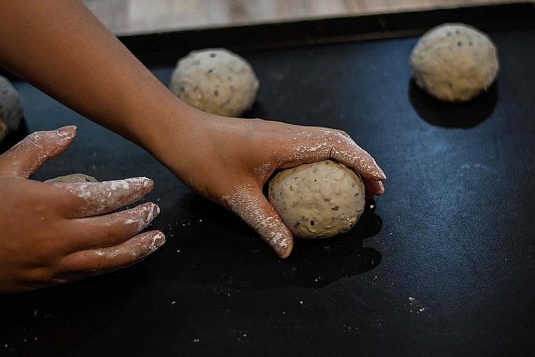 The sheer act of shaping and forming dough has helped many people to overcome the ennui of lockdowns, says the writer.