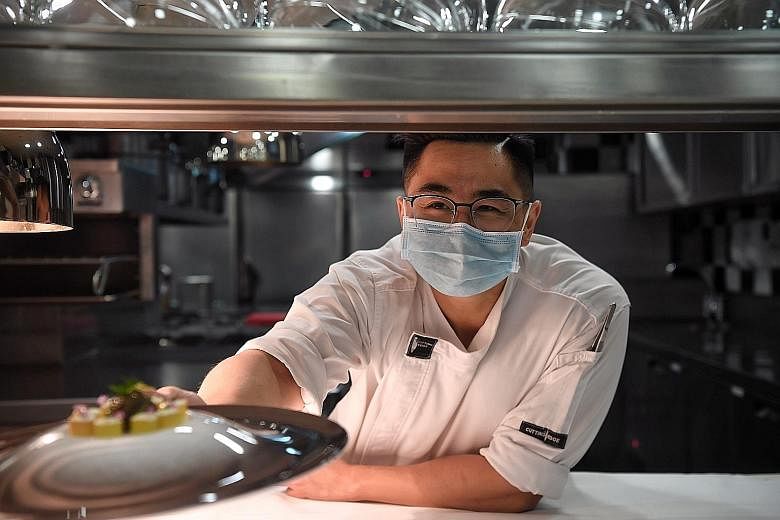Now a chef de partie at Les Amis, Mr Spencer Tay interned at the restaurant in 2015 during his technical diploma programme and returned last year as a full-time employee. ST PHOTO: KUA CHEE SIONG