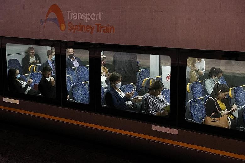 Commuters on a train in Sydney, Australia, last week. Almost 70 per cent of Australia's population of 25.6 million residents live in the eight capital cities. More than 40 per cent live in Sydney and Melbourne.