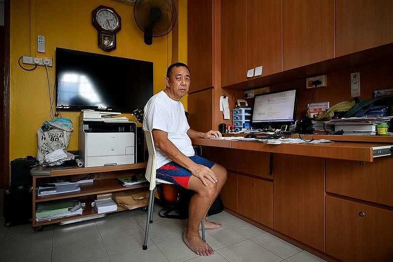 Mr Lim Thiam Ho said that after finding that his credit balance had been almost totally depleted, he called the UOB hotline to inform the bank that he had fallen victim to a phone scam. ST PHOTO: LIM YAOHUI