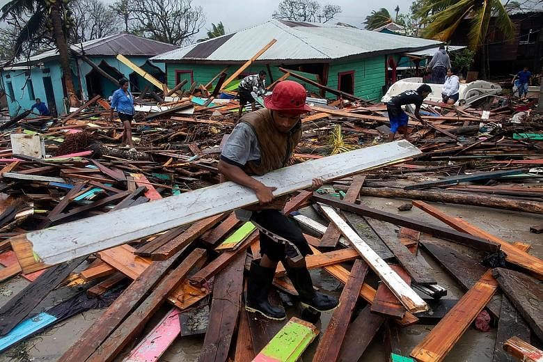 The Nicaraguan port of Puerto Cabezas, which is still partly flooded and strewn with debris left by Hurricane Eta just two weeks before, bore the brunt of Iota on Tuesday. PHOTO: AGENCE FRANCE-PRESSE