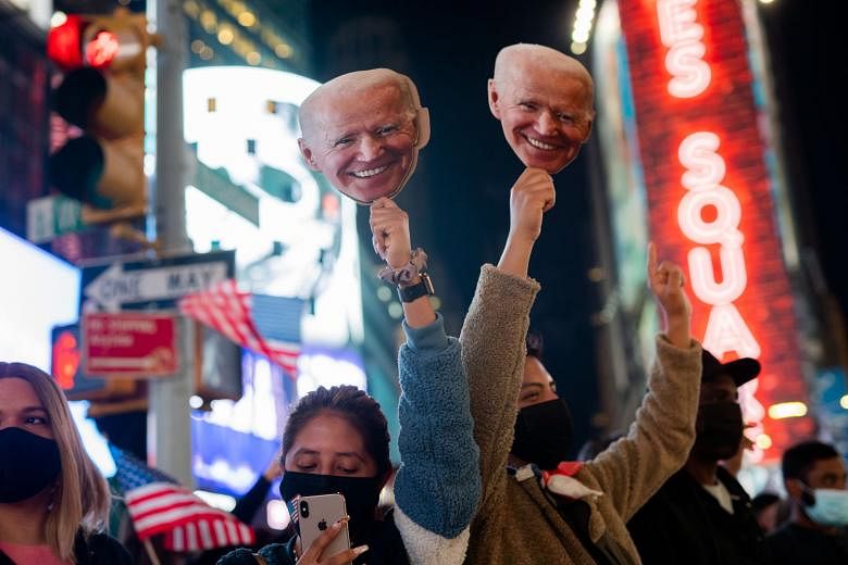 United States President-elect Joe Biden's supporters celebrating his election win in New York on Nov 7. Singapore's Prime Minister Lee Hsien Loong said he hopes that the Biden administration will take "a more coherent, systematic approach" in the US'