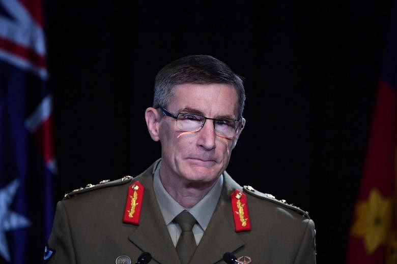 General Angus Campbell, chief of the Australian Defence Force, delivering the findings from the Inspector-General of the Australian Defence Force Afghanistan Inquiry in Canberra on Thursday. The report recommended referring 19 current and former sold