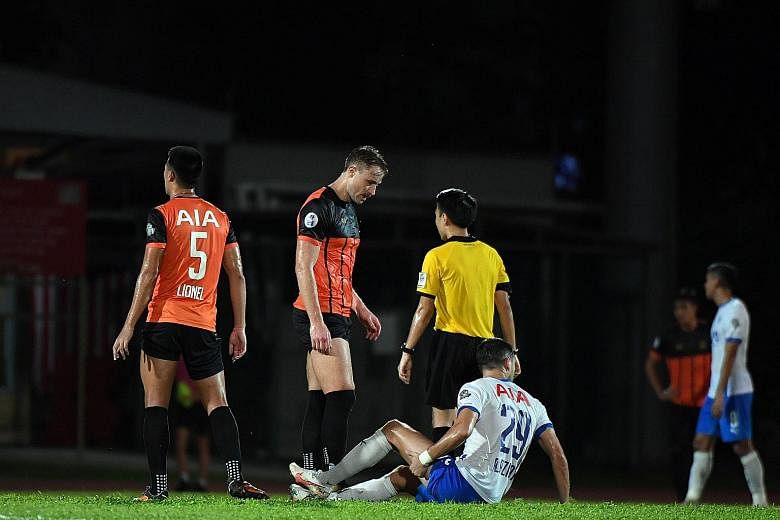 Lion City Sailors' forward Stipe Plazibat on the ground with an injury in their SPL match against Hougang last Tuesday. He has accounted for 14 of the Sailors' 29 goals, with the rest scored by nine different players.