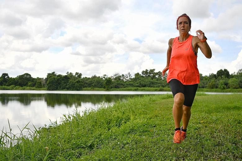 Veronique Bourbeau training for her African adventure at the Kranji Reservoir on Friday. In 2016, she ran 3,010km across Japan in 72 days with her daughter cycling beside her with a baby carriage full of equipment.