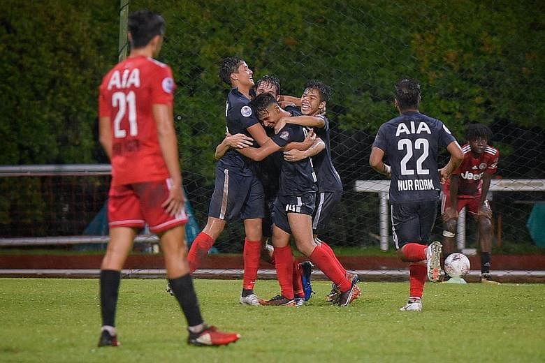 The jubilant Young Lions after a dramatic late goal sealed a 2-1 win over Balestier Khalsa in their Singapore Premier League match at Bishan Stadium yesterday.