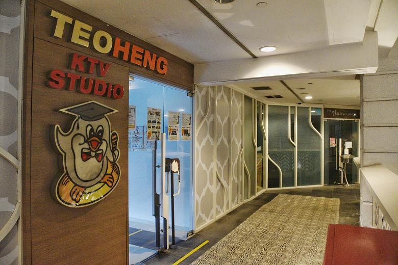 Karaoke outlets, such as Cash Studio in Clarke Quay Central (above, left) and Teo Heng KTV Studio in Rendezvous Hotel, have remained closed as part of Covid-19 measures. The pilot to reopen selected establishments will widen to include certain karaok