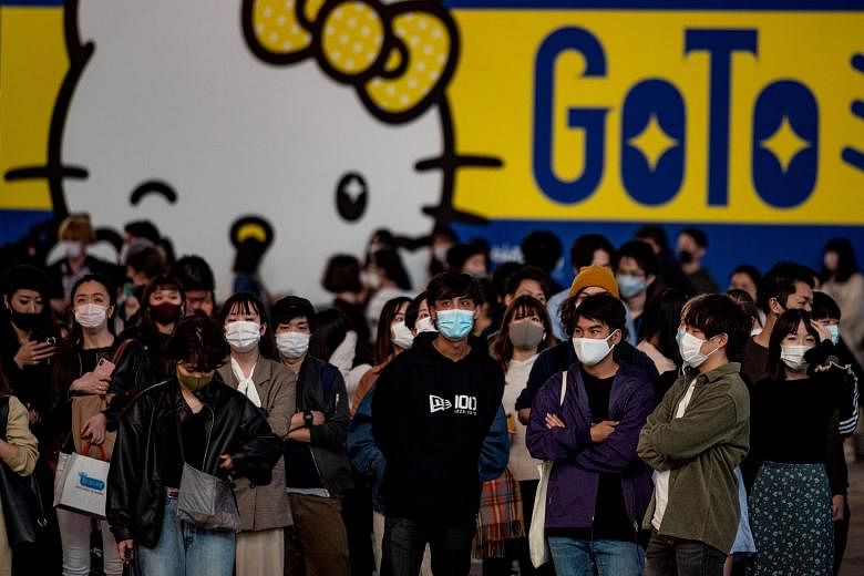 Tokyo recorded 539 new Covid-19 infections yesterday, marking the third straight day the city has logged more than 500 cases. PHOTO: AGENCE FRANCE-PRESSE
