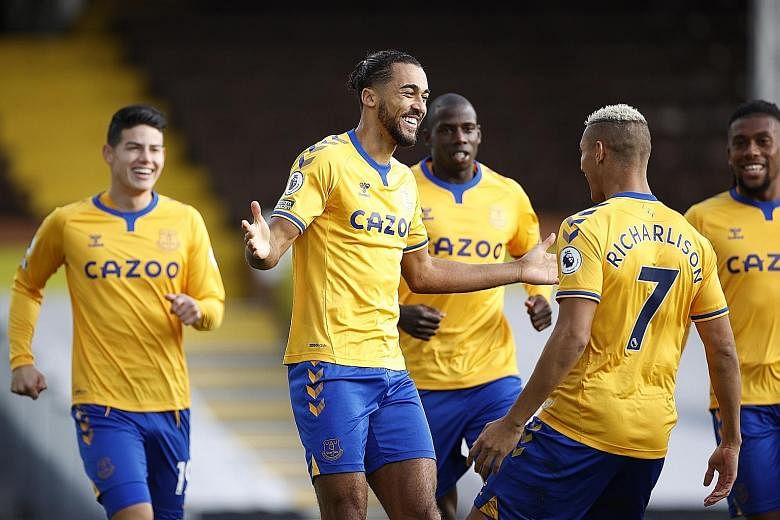 Striker Dominic Calvert-Lewin celebrating his opener after 42 seconds with provider Richarlison and his other Everton teammates.
