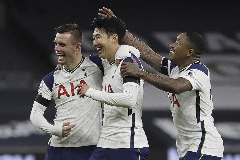 Spurs midfielder Giovani lo Celso (far left) celebrating with Son Heung-min and Steven Bergwijn following his strike 35 seconds after coming off the bench against Manchester City in the Premier League on Saturday.