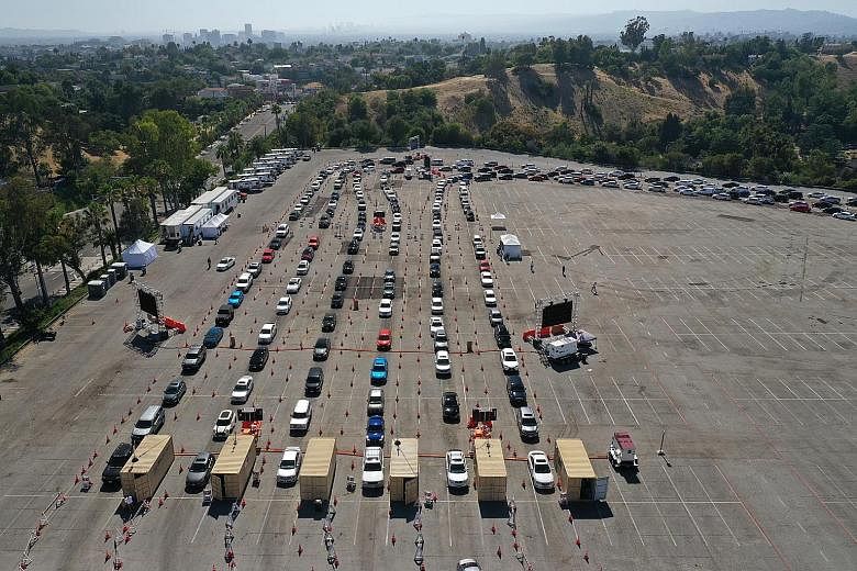 Cars lined up at a Covid-19 drive-through testing site in Los Angeles, California, in July. The United States has recorded over a quarter of a million deaths from the disease amid the pandemic.