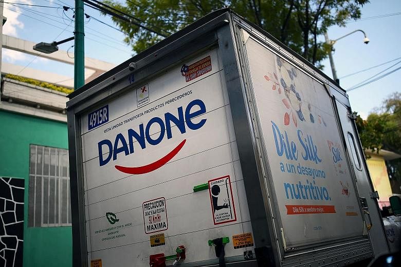 French food group Danone's logo pictured on a truck in Mexico City, Mexico. It is shifting its focus to geographical zones rather than product categories.