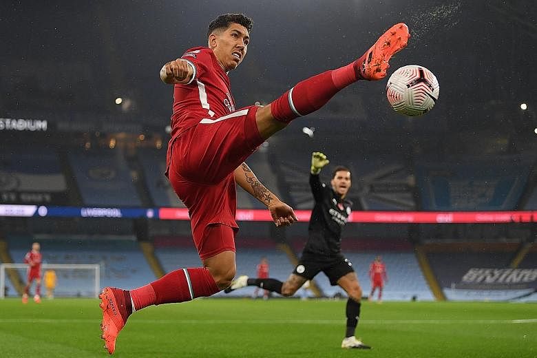 Liverpool's Roberto Firmino playing against Man City this month. Manager Jurgen Klopp lauded his contribution even when he was not scoring.