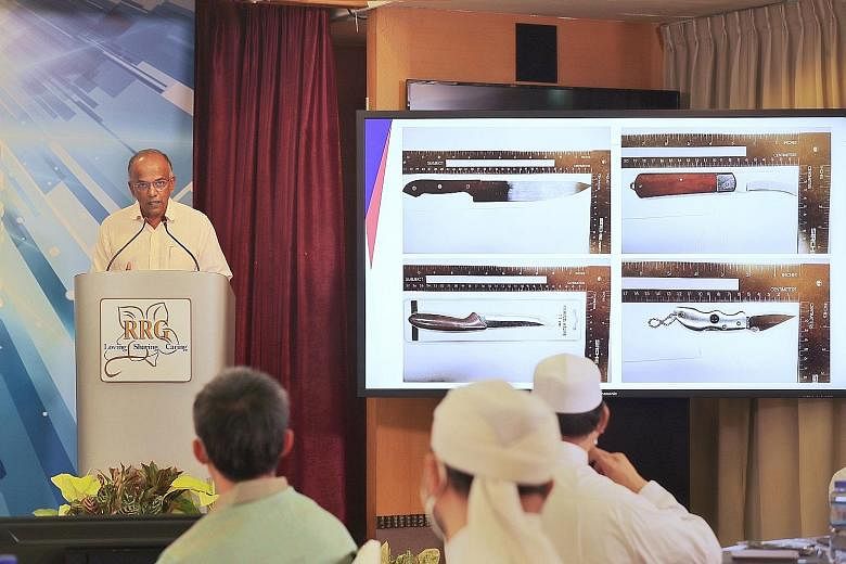 Home Affairs and Law Minister K. Shanmugam speaking during the Religious Rehabilitation Group's seminar at Khadijah Mosque yesterday. He said regional terrorists are adapting and diversifying the way they carry out attacks - for instance, by favourin